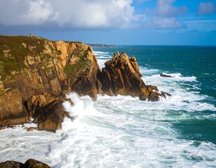 Dramatic coastal scene with rugged cliffs and powerful waves crashing against the rocks under a partly cloudy sky