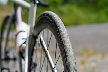Fototapeta premium Bicycle tire with a white bottle on the handlebars