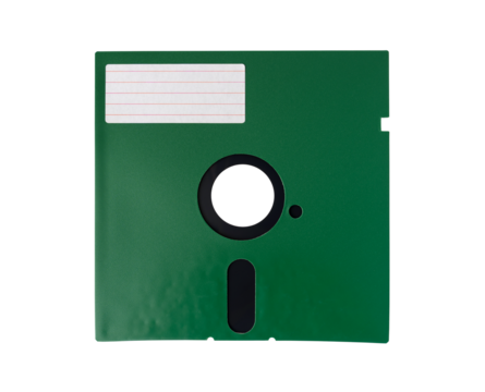 Retro vintage storage unit of computer. Old green diskette or floppy disk 5.25 inches with empty label sticker isolated on transparent background or png file.