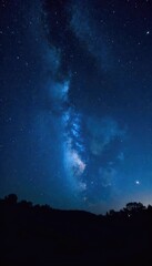 Vast, star-filled night sky over a dark, silhouetted landscape Perfect for astronomy, space, and nature-themed projects Deep blues and blacks contrast with bright celestial bodies , stars, cosmos