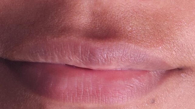 Close up Macro of Indian teenage girl lips doing various types of expressions.