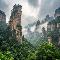 Zhangjiajie National Forest – towering sandstone pillars covered with mist and green forests.