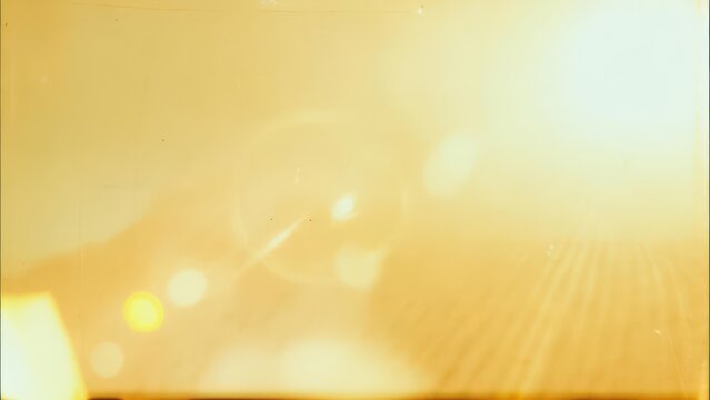 Ethereal Golden Light Leak with Nostalgic Bokeh and Sun Rays