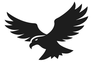 Silhouette of a hawk with wings spread in flight on black bird falcon