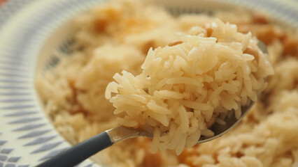 Delicious bowl of rice served in a traditional style