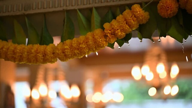 Mango Leaf and Marigold Garland on Festive Entrance Lintel with Dew and Bokeh Lights