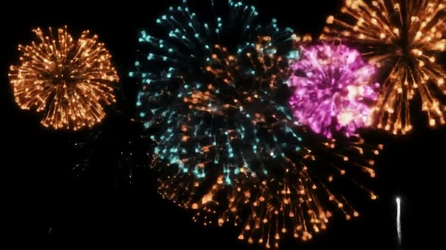 Vibrant Teal, Magenta, and Gold Fireworks Explode in a Dazzling Abstract Night Display