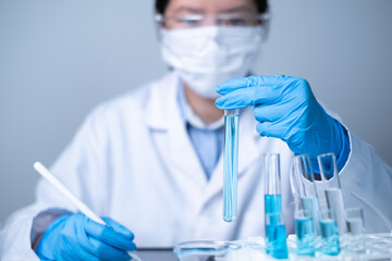 Chemist scientist working in laboratory science research test experiment data analysis report...
