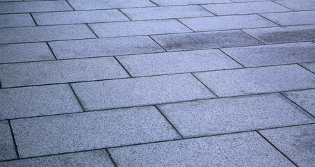 Close-up of a tiled street pavement