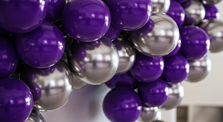 Fototapeta premium Abstract Arrangement of Purple and Silver Spheres with Reflective Surfaces.