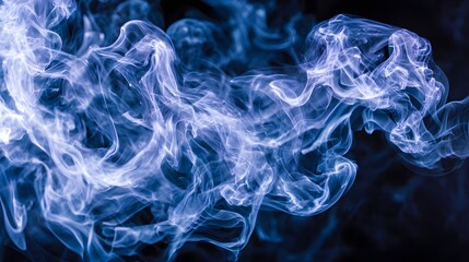 Abstract design of swirling blue smoke on black background.