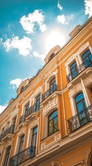 Obraz premium Ornate, yellow building facade, sunlit