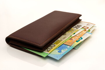 Euro Banknotes in Brown Leather Wallet with Cash Visible on White Background