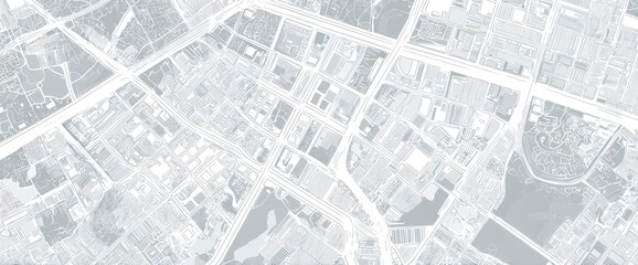 High-angle view of a city's street layout. Detailed map showing city blocks, roads, and various land use areas in light grayscale