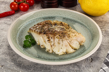 Baked cod fish fillet with spices