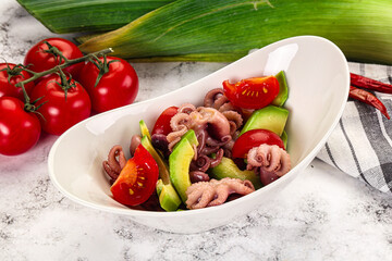 Salad with baby octopus and avocado