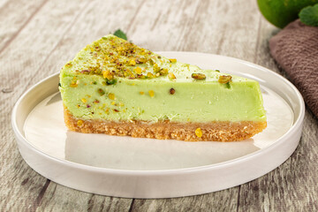 Green pistachio cheesecake served mint