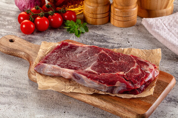 Gourmet raw rib eye steak