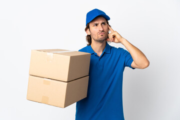 Delivery man isolated on white background having doubts and thinking