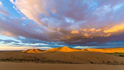 Golden sunset over sand dunes