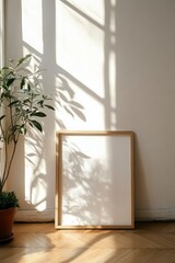 Empty Wooden Frame Mockup With Olive Plant In A Sunlit Room