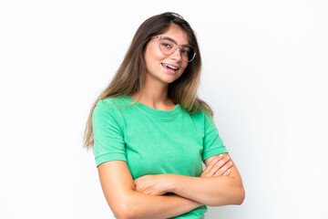 Young caucasian woman isolated on white background with arms crossed and looking forward