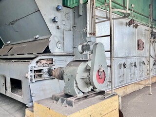 Captivating industrial image showing the raw power and complexity of a large boiler and machinery...