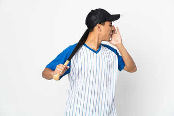 Man playing baseball over isolated white background shouting with mouth wide open to the side