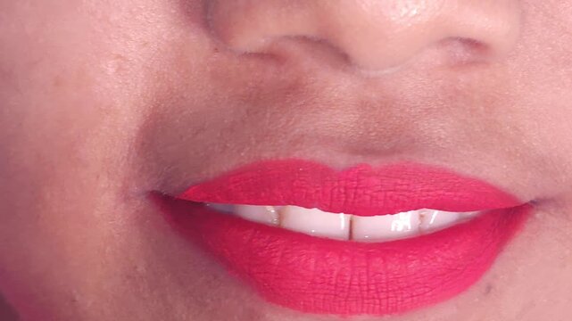 Close up Macro of Indian teenage girl lips doing various types of expressions. lift, Frown, grimace, moue, scowl, pout, Kiss, smooch, smack, peck, graze, caress, skim
