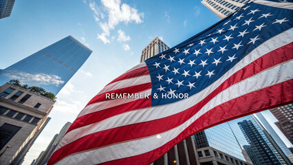 American flag waving against tall buildings, viewed from below. The text reads "Remember & Honor".

