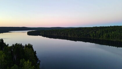Fototapeta premium Serene lake vista at dawn/dusk