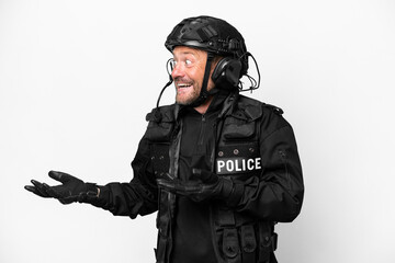 Middle age SWAT man isolated on white background with surprise facial expression