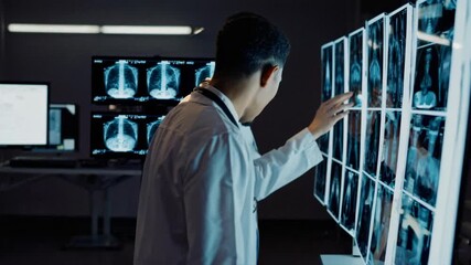 Medical professionals analyzing digital xrays in a hightech diagnostic lab environment - Powered by Adobe