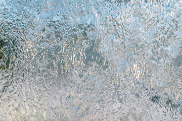 Aqua background. Product space next to clean water streams and water splashes and drops.