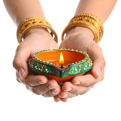 Indian festival happy diwali, female hands hold a diya or oil lamp on transparent background