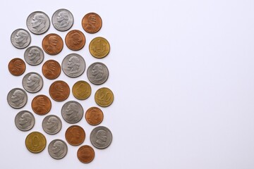 Assorted US Coins on a White Background: Financial Wealth, Savings, and Currency Concept
