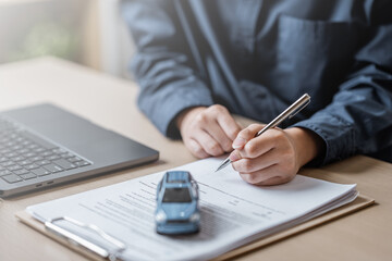 Buying car agreement. Car dealershipsigning contract. Purchase automotive agreement. Car insurance protection. Debt expense monthly. Vehicle assurance.