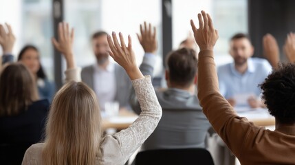 Diverse Group Raising Hands in Meeting: Active Participation and Engagement in Business Setting