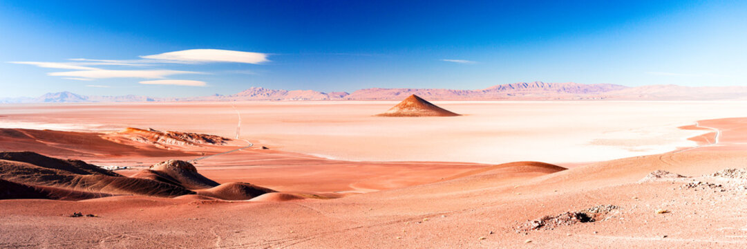 Sunset view of Arita volcanic cone in Salar de Arizaro