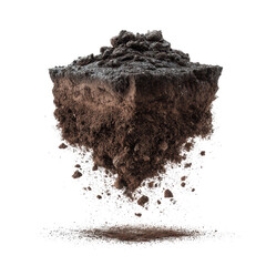 Soil suspended in air showcasing texture and organic matter at close range under artificial lighting conditions