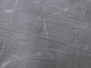 A rustic, coarse gray wall texture perfect for a vintage, artistic, minimalistic, and simple...