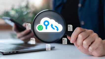 Magnifying glass focusing on cloud icon with security and verification symbols, representing cloud data protection, document management, and digital storage.