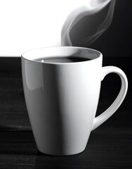 Obraz premium A white mug of hot coffee