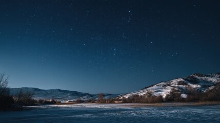 A calm winter landscape at night, with snow-covered hills and a clear sky filled with bright stars.
