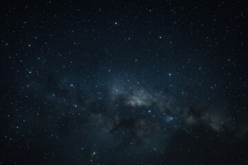 Obraz premium A cosmic tapestry of stars and nebulae, captured in a starry night sky