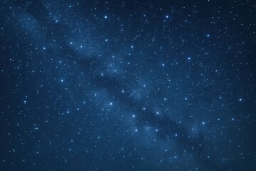 Obraz premium A celestial tapestry of stars in deep blue, a cosmic symphony of light against the dark canvas of space