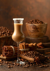 Irish cream and coffee liqueur on a brown background.