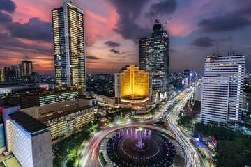 Jakarta skyline taken in a fantastic blue hour, with the big roundabout that hold the iconic...