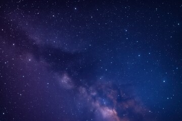 Obraz premium A cosmic canvas of twinkling stars against the velvet expanse of space