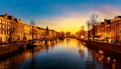 Obraz premium Colorful cityscape at sunset in amsterdam 